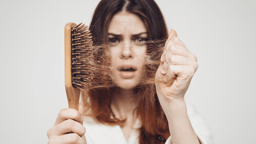 Queda de cabelo feminino